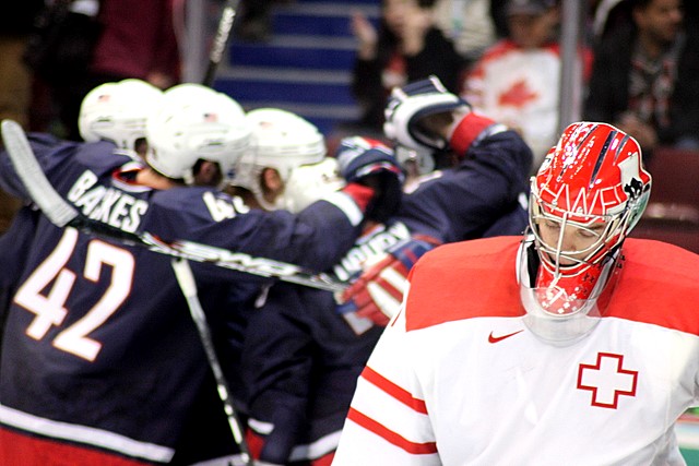 USA vs Switzerland<br>2010 Winter Olympics<br>Vancouver, BC<p>Camera: Canon EOS Rebel T1i<br>Quantaray 70-300 mm lens